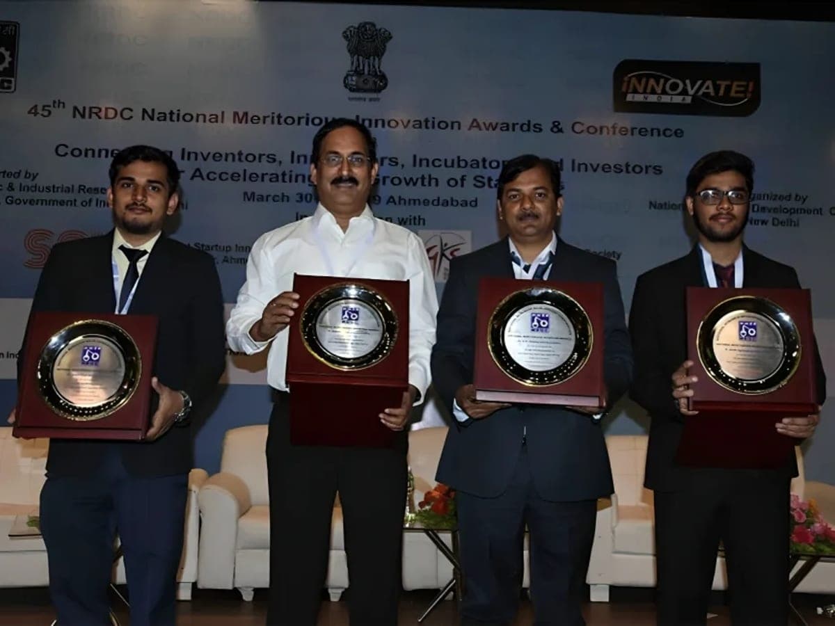 The Acquafront team holding awards at the NRDC National Meritorious Innovation Awards.